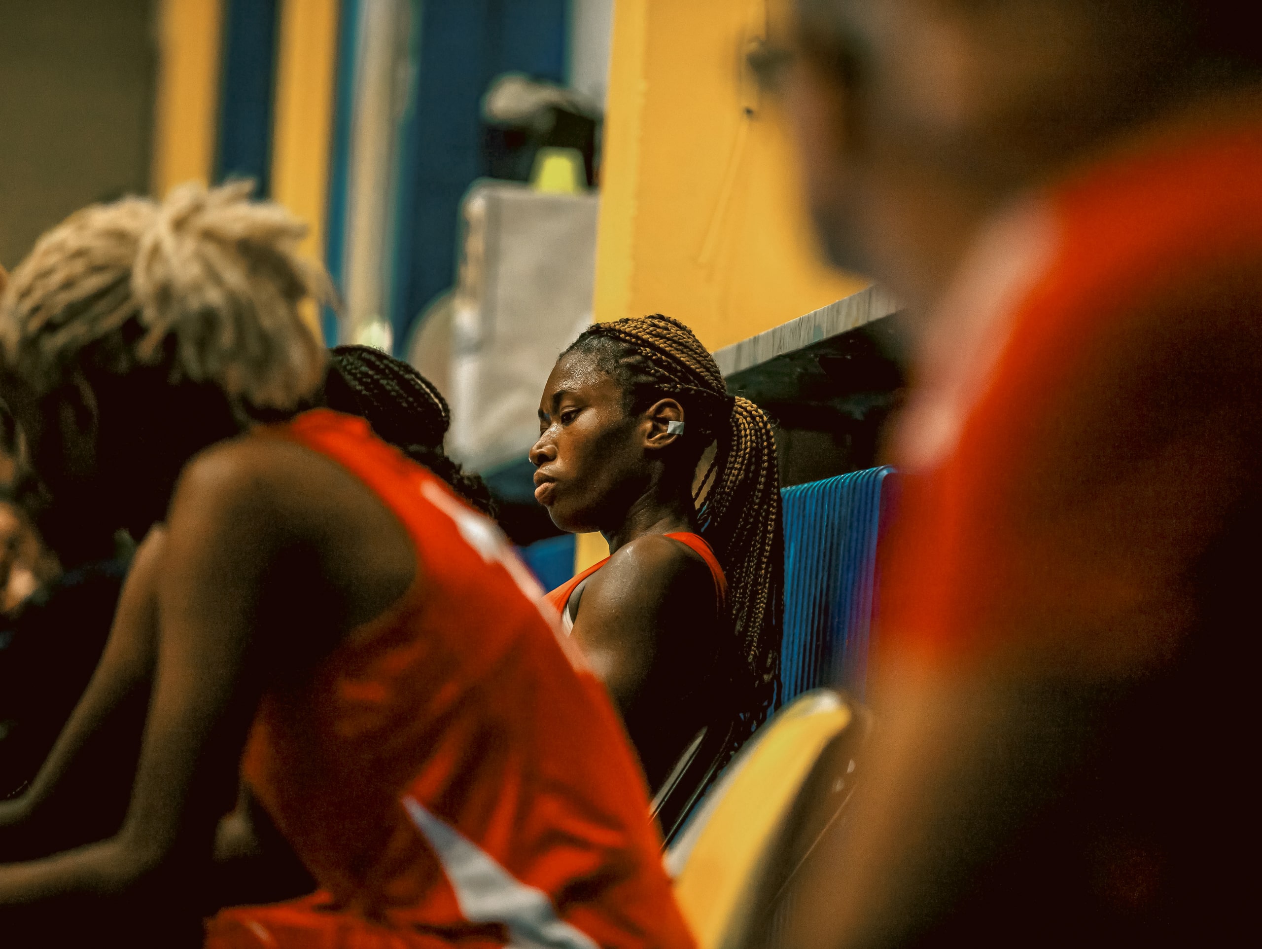 A female athlete in Florida reflecting on gambling challenges and the importance of responsible play with Playwise.