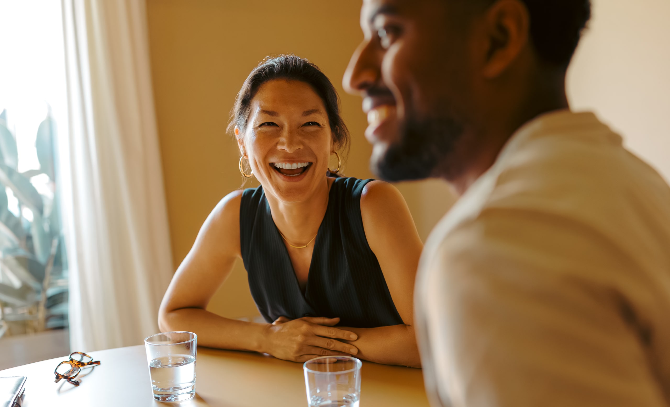 Two people in Florida having a serious conversation about concerns with problem gambling and support from Playwise.